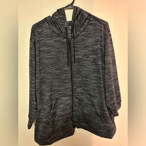 Beautiful grey and white zip-up hoodie with pockets and drawstring.